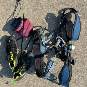 Climbing harness, clip, shoes, and chalk bag